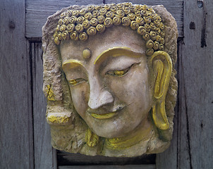 Image showing buddha face sculpture