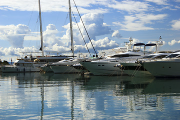 Image showing Luxury yachts moored on pier