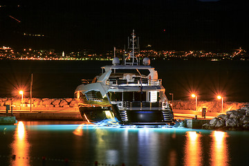 Image showing Luxury yacht moored on pier night