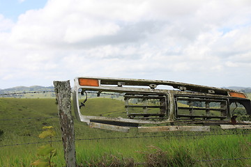 Image showing Ford on the fence