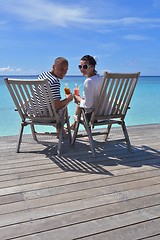 Image showing happy young couple relax and take fresh drink