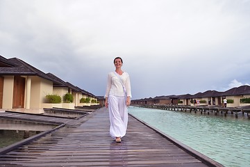 Image showing young woman relax on cloudy summer day