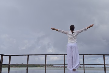 Image showing young woman relax on cloudy summer day