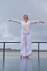 Image showing young woman relax on cloudy summer day