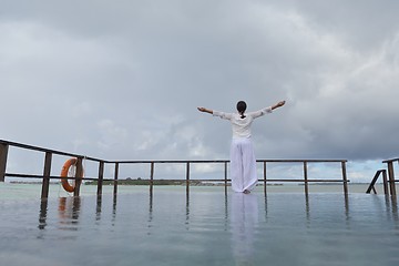 Image showing young woman relax on cloudy summer day