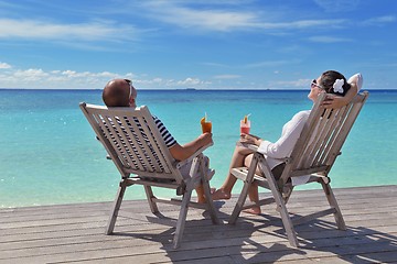 Image showing happy young couple relax and take fresh drink