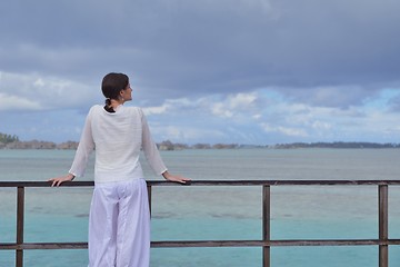 Image showing young woman relax on cloudy summer day