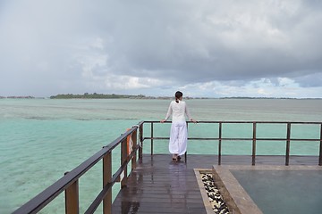 Image showing young woman relax on cloudy summer day
