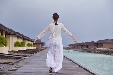 Image showing young woman relax on cloudy summer day