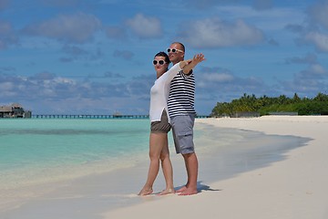 Image showing happy young  couple at summer vacation have fun and relax at bea