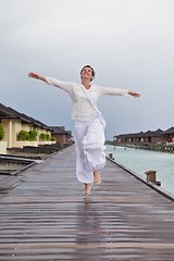 Image showing young woman relax on cloudy summer day