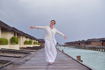 Image showing young woman relax on cloudy summer day