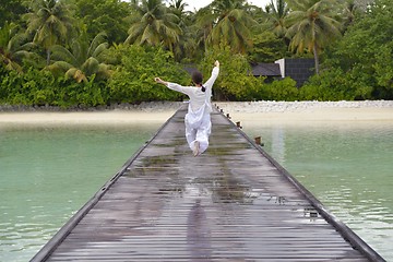 Image showing young woman relax on cloudy summer day