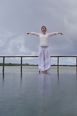 Image showing young woman relax on cloudy summer day