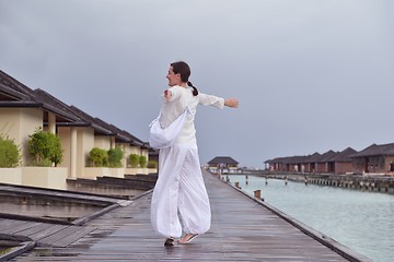 Image showing young woman relax on cloudy summer day