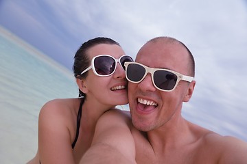 Image showing happy young  couple at summer vacation have fun and relax at bea