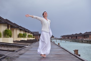 Image showing young woman relax on cloudy summer day