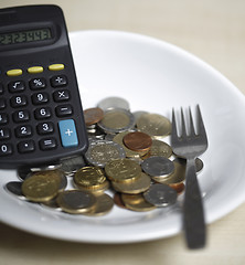 Image showing Coins on a plate