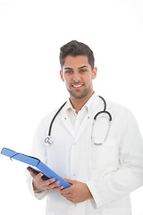 Image showing Handsome male doctor with a file