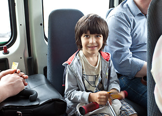 Image showing child in a public transport