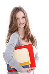 Image showing Smiling beautiful young student with books