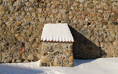 Image showing vintage fort stone wall clay tile roof snow winter 