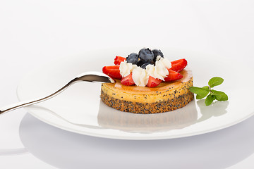 Image showing Cheesecake, blueberries and strawberries