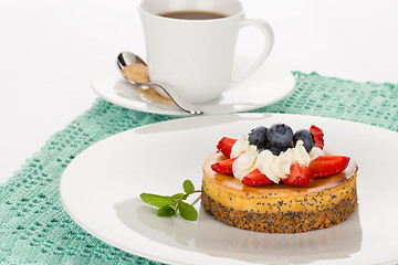 Image showing Cheesecake and cup of tea