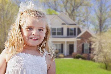 Image showing Cute Smiling Girl Playing in Front Yard