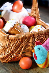 Image showing Easter basket with Easter cakes and eggs. 