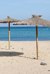 Image showing Thatch Beach Umbrellas