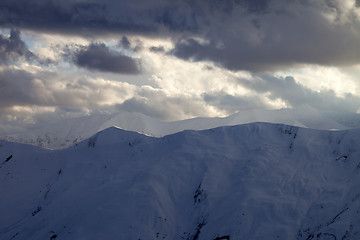 Image showing Snow mountain and storm clouds