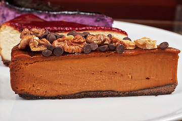 Image showing cheesecake with chocolate and nuts