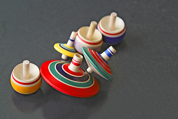 Image showing Asian wooden tops