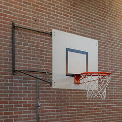 Image showing Basketball hoop on an oldbrick wall