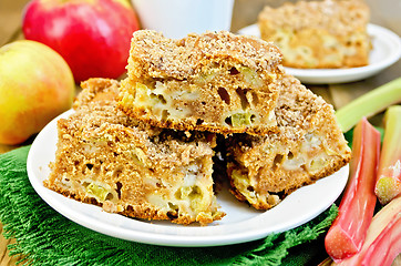 Image showing Pie with rhubarb and apples on a green napkin