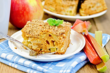 Image showing Pie with rhubarb and apples on the board