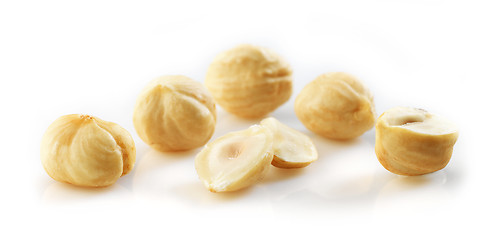 Image showing Closeup view of hazelnuts over white background