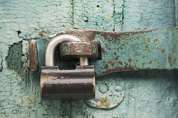 Image showing Strong lock on old door