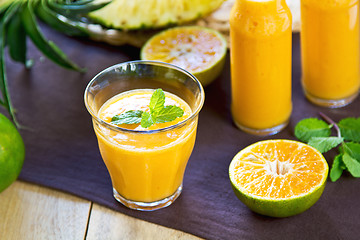 Image showing Pineapple with Orange and Mango smoothie