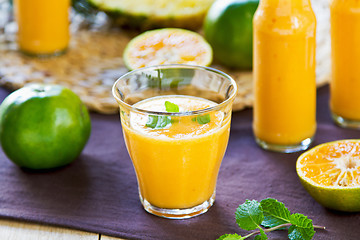 Image showing Pineapple with Orange and Mango smoothie