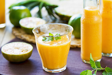 Image showing Pineapple with Orange and Mango smoothie