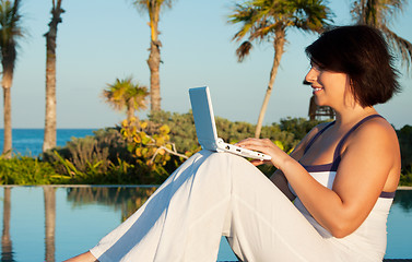 Image showing lovely woman with laptop computer