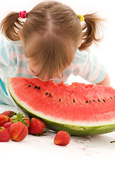 Image showing little girl with strawberry and watermelon