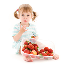 Image showing little girl with strawberry