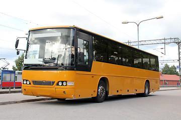 Image showing Yellow Bus at Railway Station