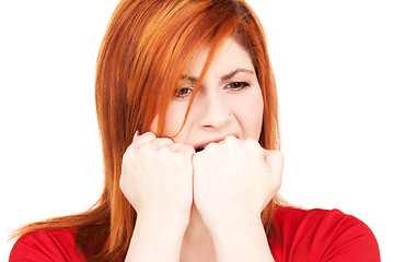 Image showing unhappy redhead woman