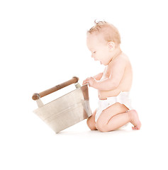 Image showing baby boy with wash-tub