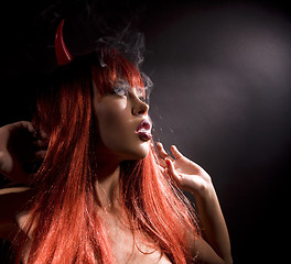 Image showing smoking devil