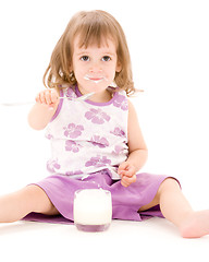 Image showing little girl with yoghurt